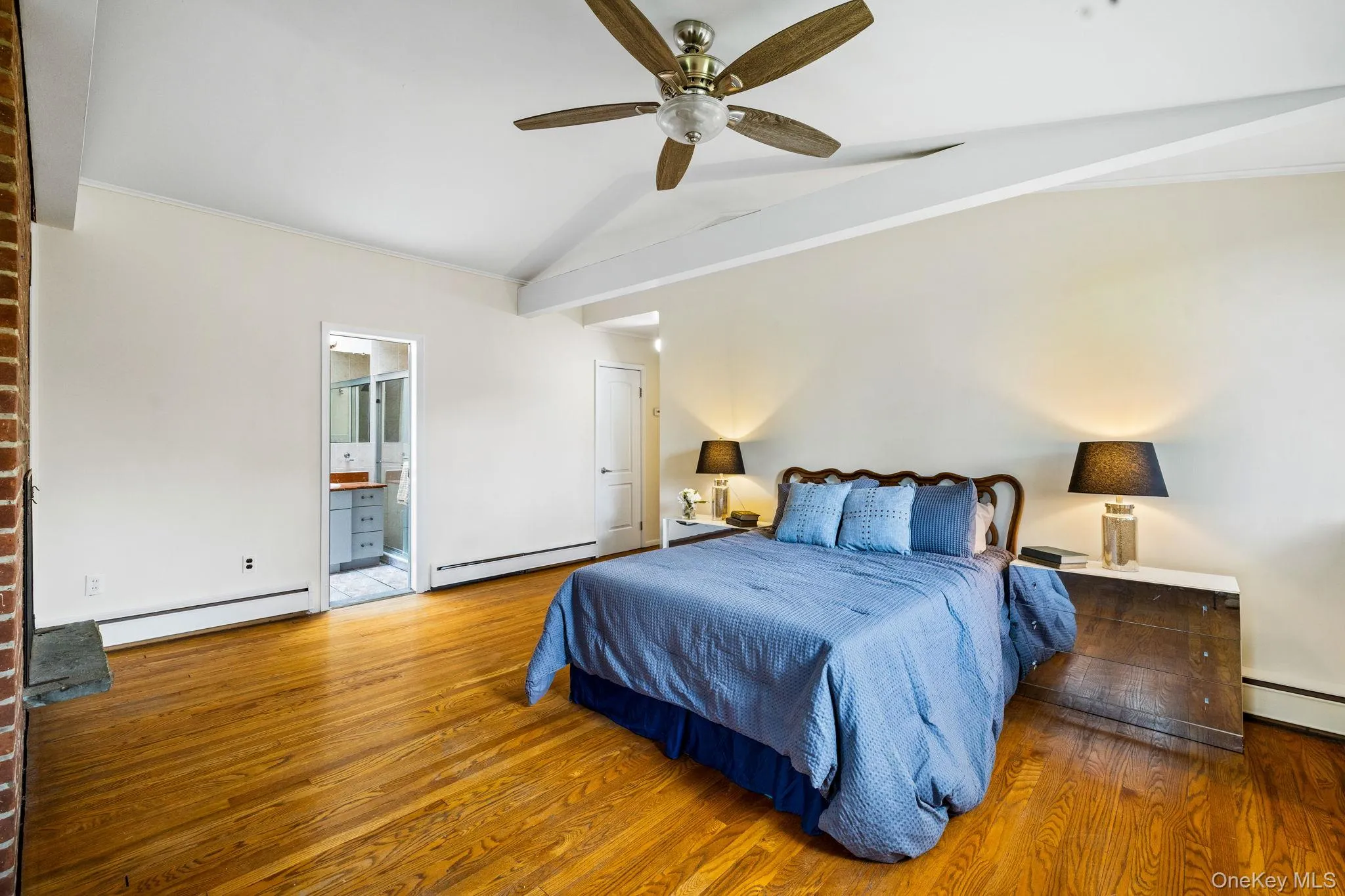 Master Bedroom with Hardwood Floors, lots of Natural Light from Over Sized Windows. Master Bedroom with Hardwood Floors, lots of Natural Light from Over Sized Windows.