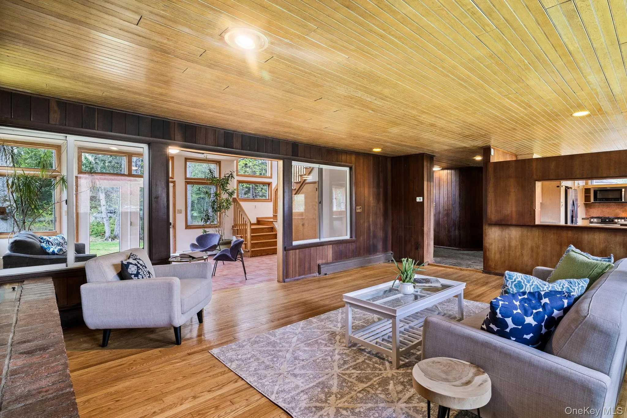 Wall of Windows Leads to Family Room filled with Windows & Natural Light. Wall of Windows Leads to Family Room filled with Windows & Natural Light.