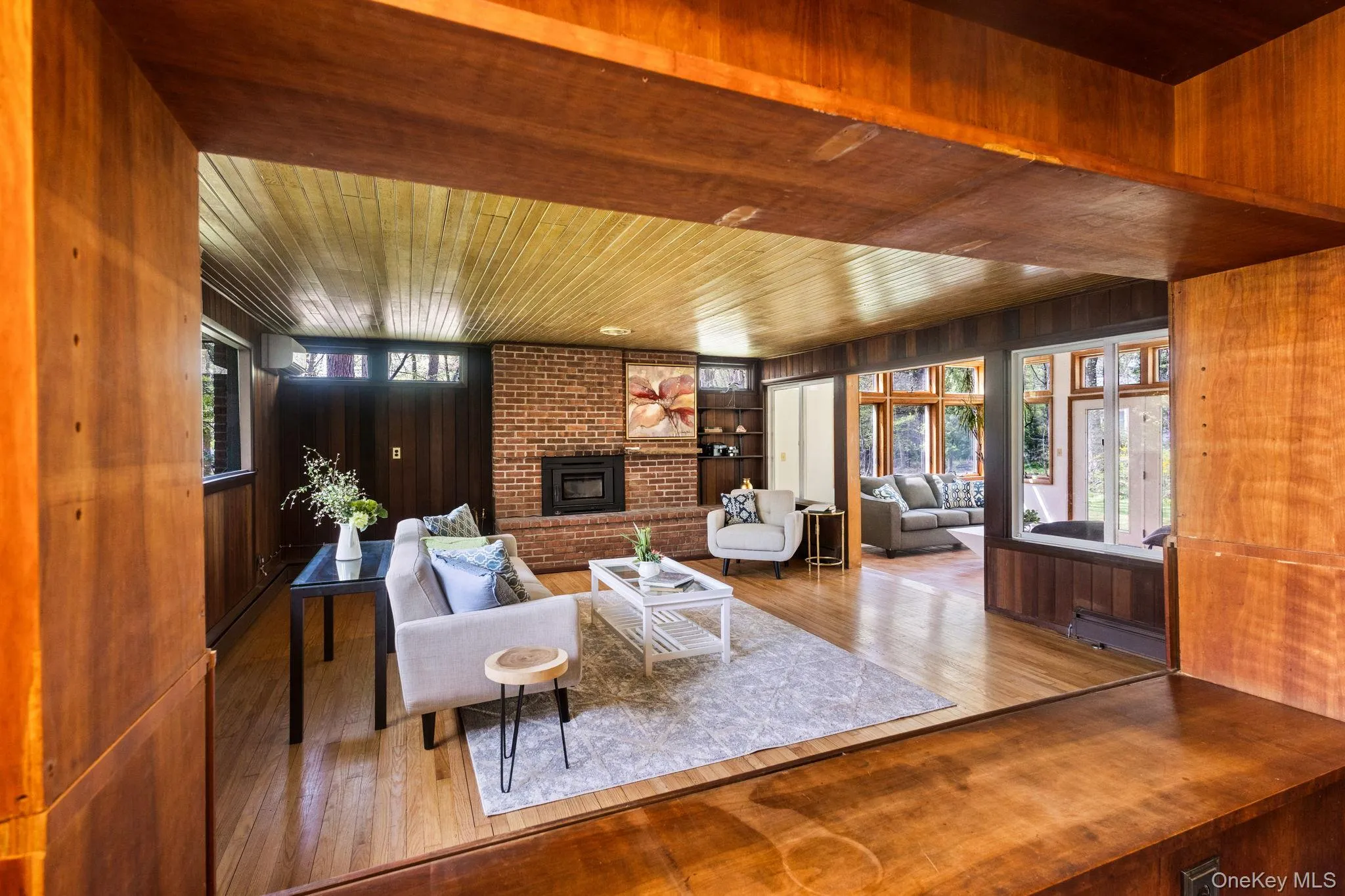 Bird's Eye View through the Warm Woods Pass Through from Kitchen. Bird's Eye View through the Warm Woods Pass Through from Kitchen.