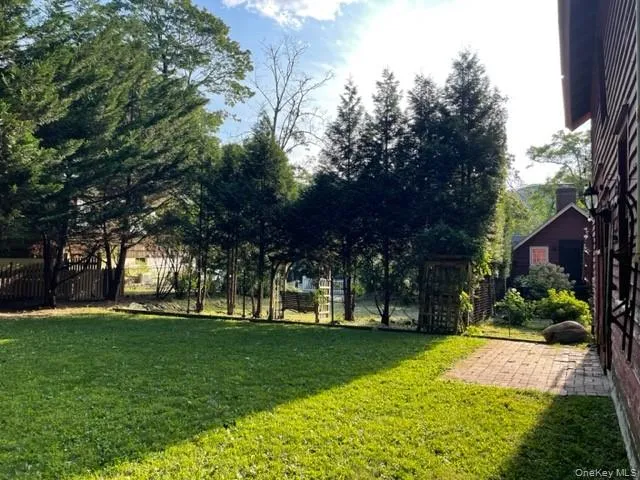 View of yard featuring a patio View of yard featuring a patio