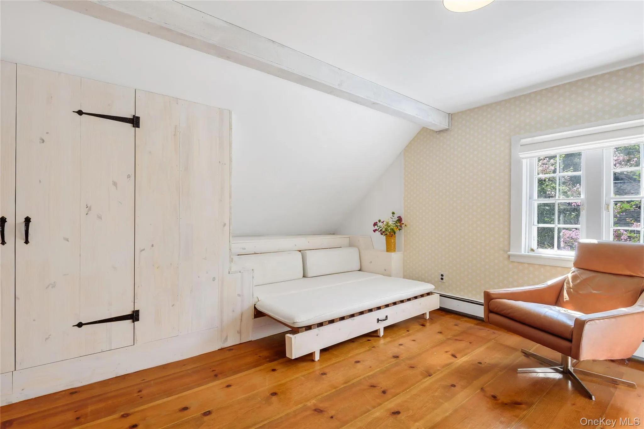 Bedroom with wood-type flooring, lofted ceiling Bedroom with wood-type flooring, lofted ceiling