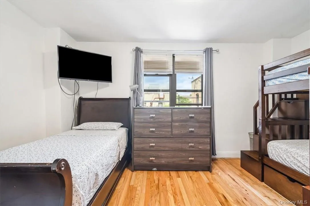 Bedroom featuring light hardwood / wood-style floors Bedroom featuring light hardwood / wood-style floors