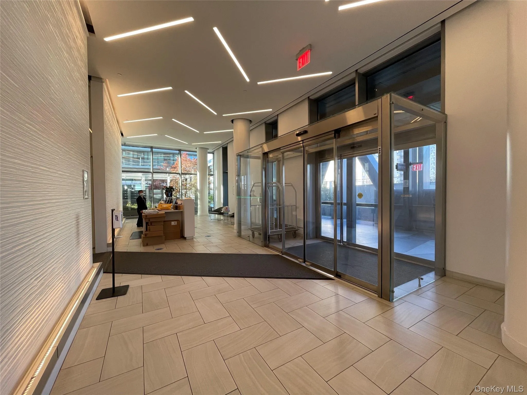 Lobby with floor to ceiling windows Lobby with floor to ceiling windows