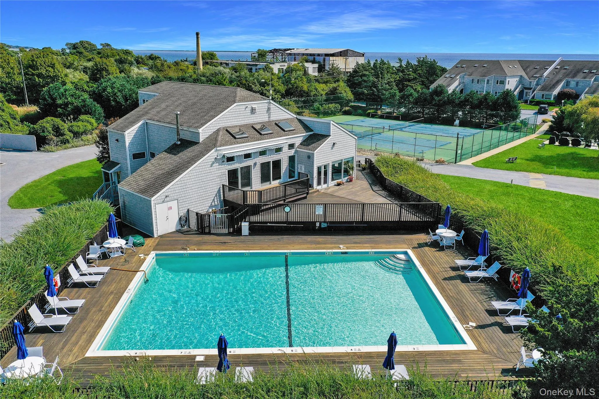 In-ground with privacy landscaping by the gym and tennis courts. This is resort level features you just can't find on the North Fork. In-ground with privacy landscaping by the gym and tennis courts. This is resort level features you just can't find on the North Fork.
