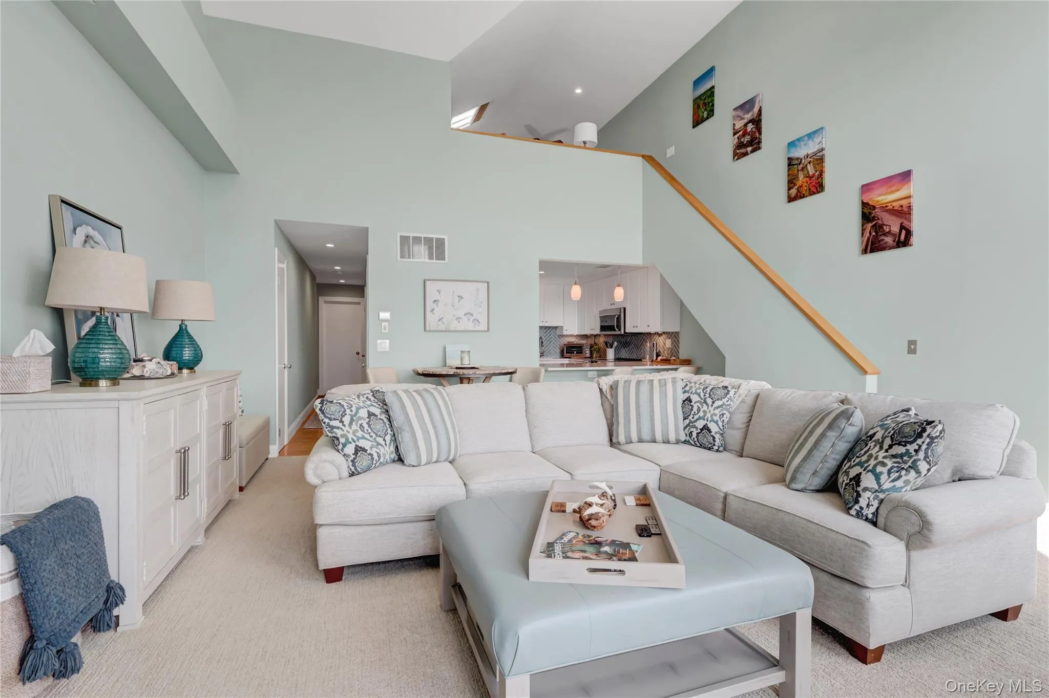 Living room has an open den upstairs for extra space. Living room has an open den upstairs for extra space.