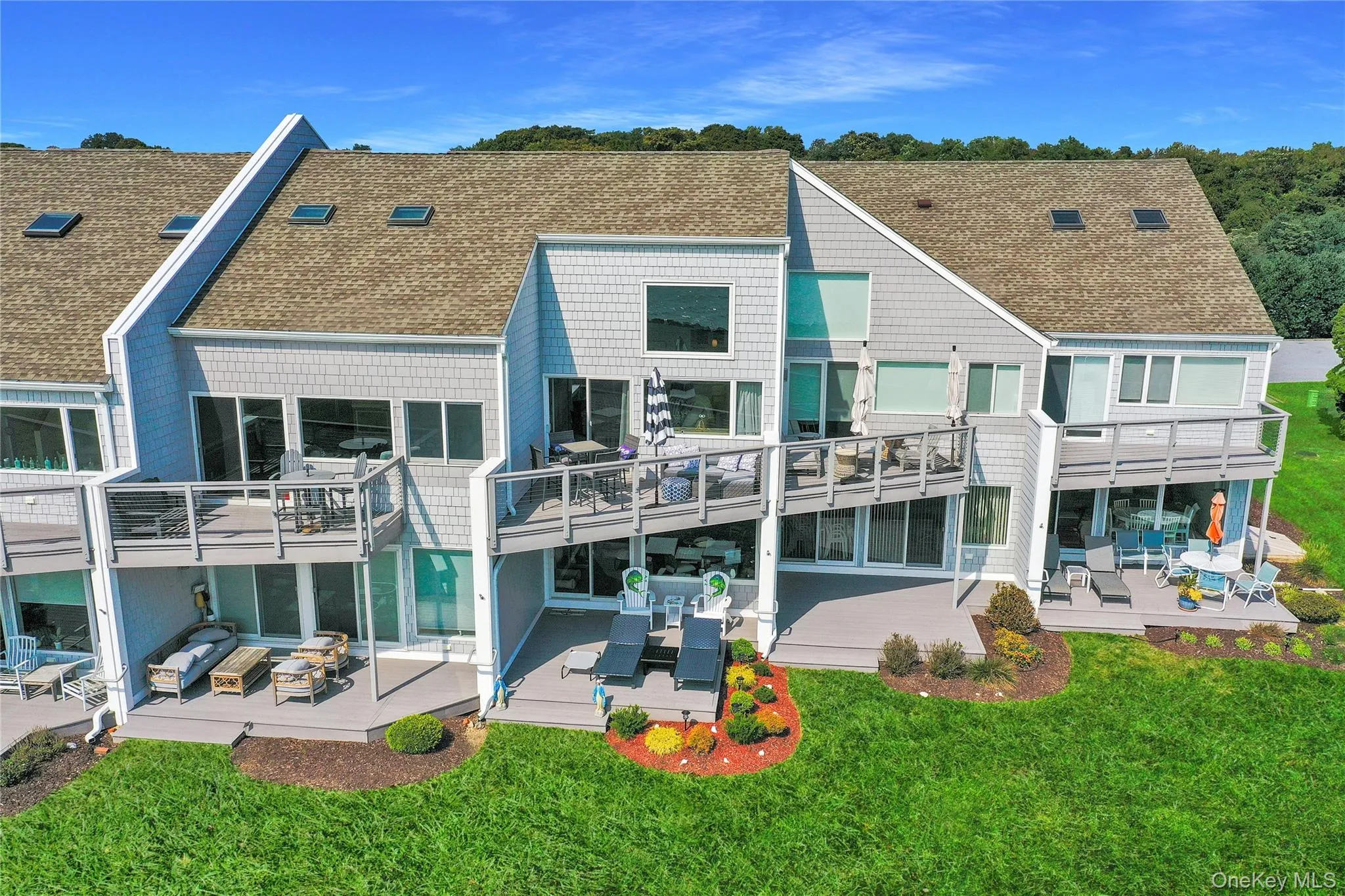 Second floor deck brings privacy from the neighbors and outstanding views over the water. Second floor deck brings privacy from the neighbors and outstanding views over the water.