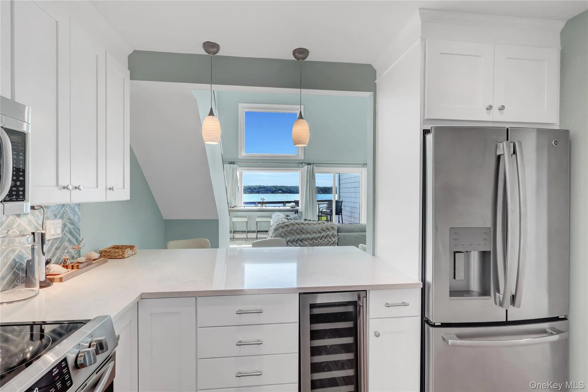 Kitchen has an open view out through the living room and stunning view over the water. Food preparation with a water view is everyone sense of luxury living. Kitchen has an open view out through the living room and stunning view over the water. Food preparation with a water view is everyone sense of luxury living.
