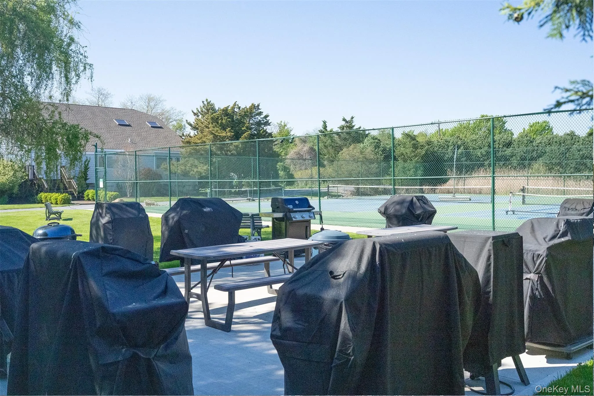 Gas grill patio is right across from this unit for easy summer grilling. Each owner gets a spot for their own grills. Gas grill patio is right across from this unit for easy summer grilling. Each owner gets a spot for their own grills.