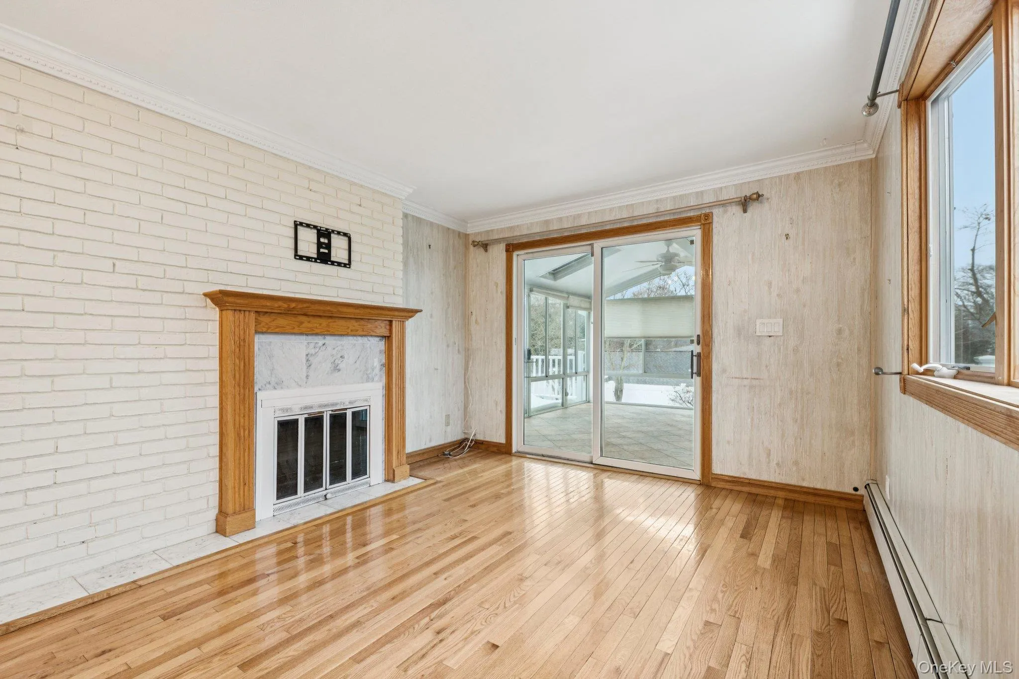 Nice hardwood floors and sliders to the Sunroom/Funroom Nice hardwood floors and sliders to the Sunroom/Funroom