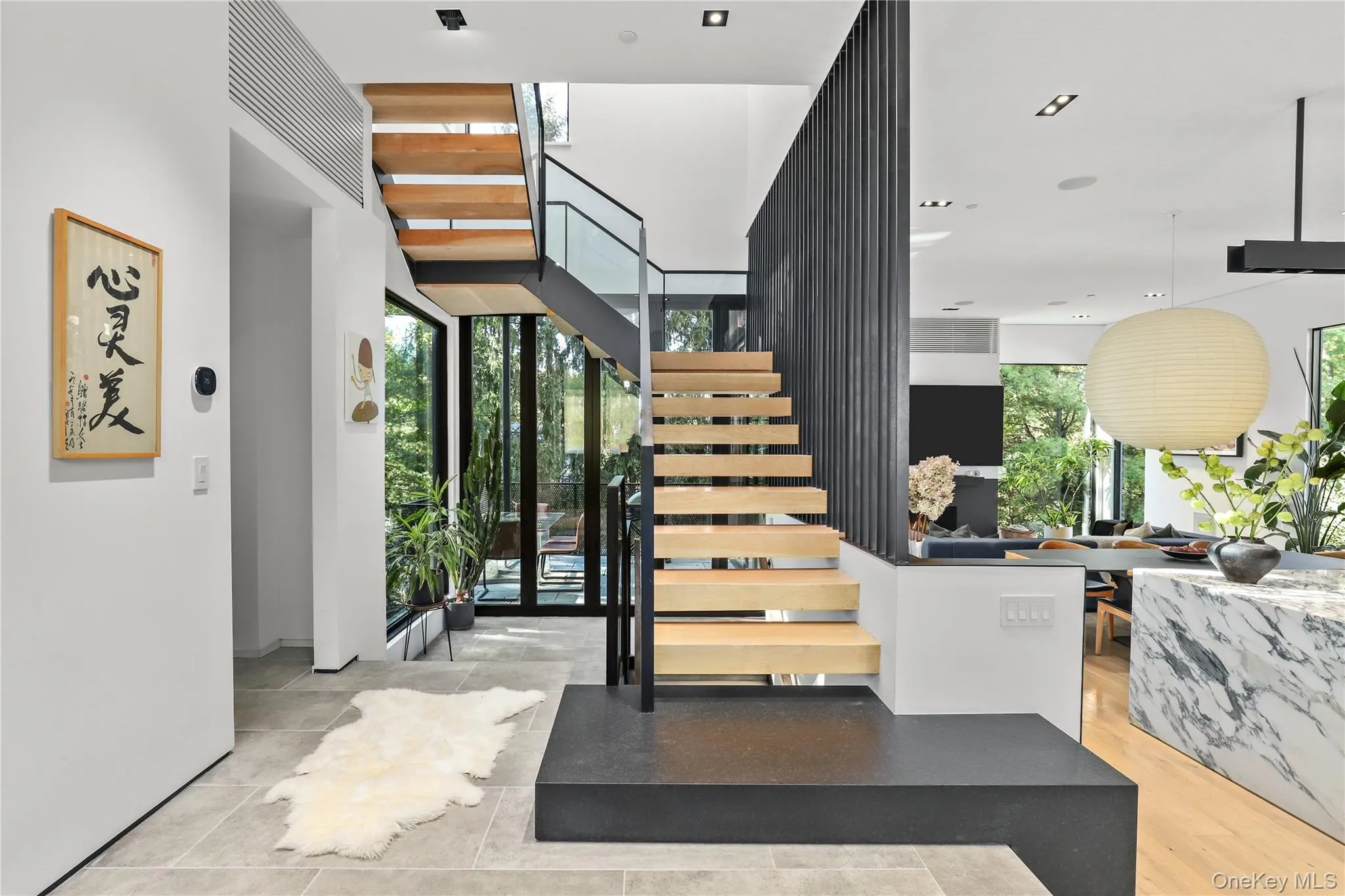 Entry View – Front-to-back sightlines highlight the home’s scale and light. Entry View – Front-to-back sightlines highlight the home’s scale and light.