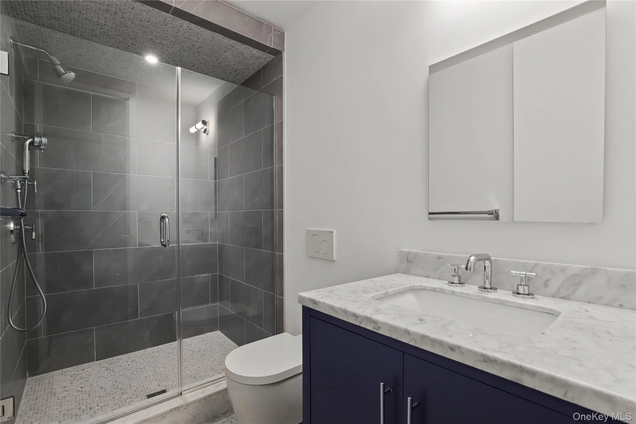 LL - Full Bath – Modern bath with ample storage and polished fixtures. LL - Full Bath – Modern bath with ample storage and polished fixtures.
