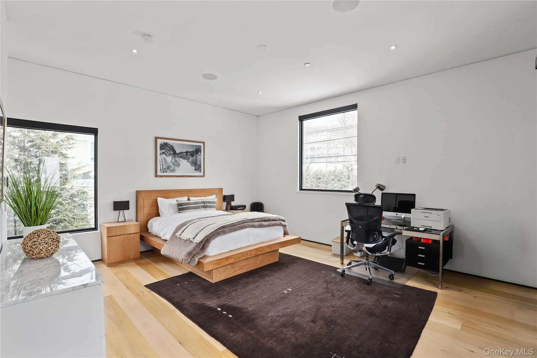 Above the Garage - Bedroom – Light-filled bedroom with tranquil views and clean finishes. Above the Garage - Bedroom – Light-filled bedroom with tranquil views and clean finishes.