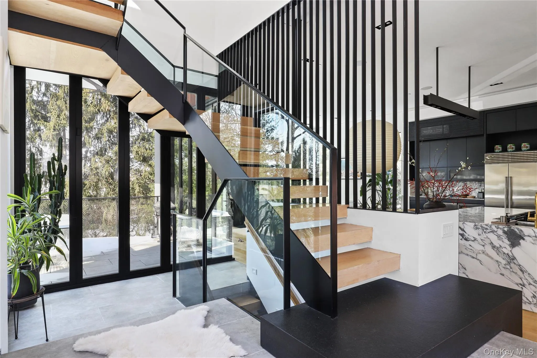Floating Stair Detail – Sculptural steel, glass and oak stairs add a signature architectural moment Floating Stair Detail – Sculptural steel, glass and oak stairs add a signature architectural moment