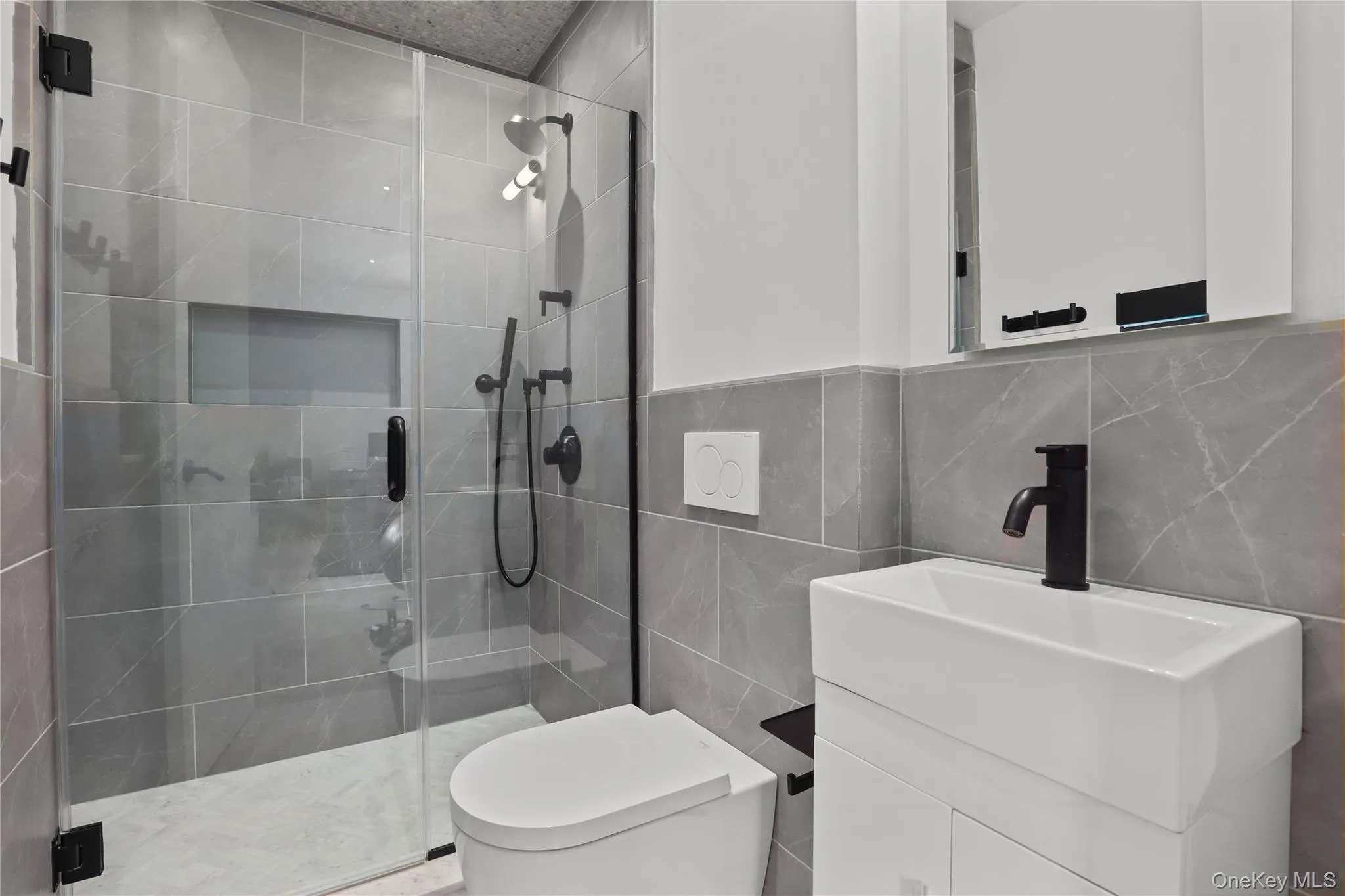 Full Bath – Modern bath with ample storage and polished fixtures. Full Bath – Modern bath with ample storage and polished fixtures.