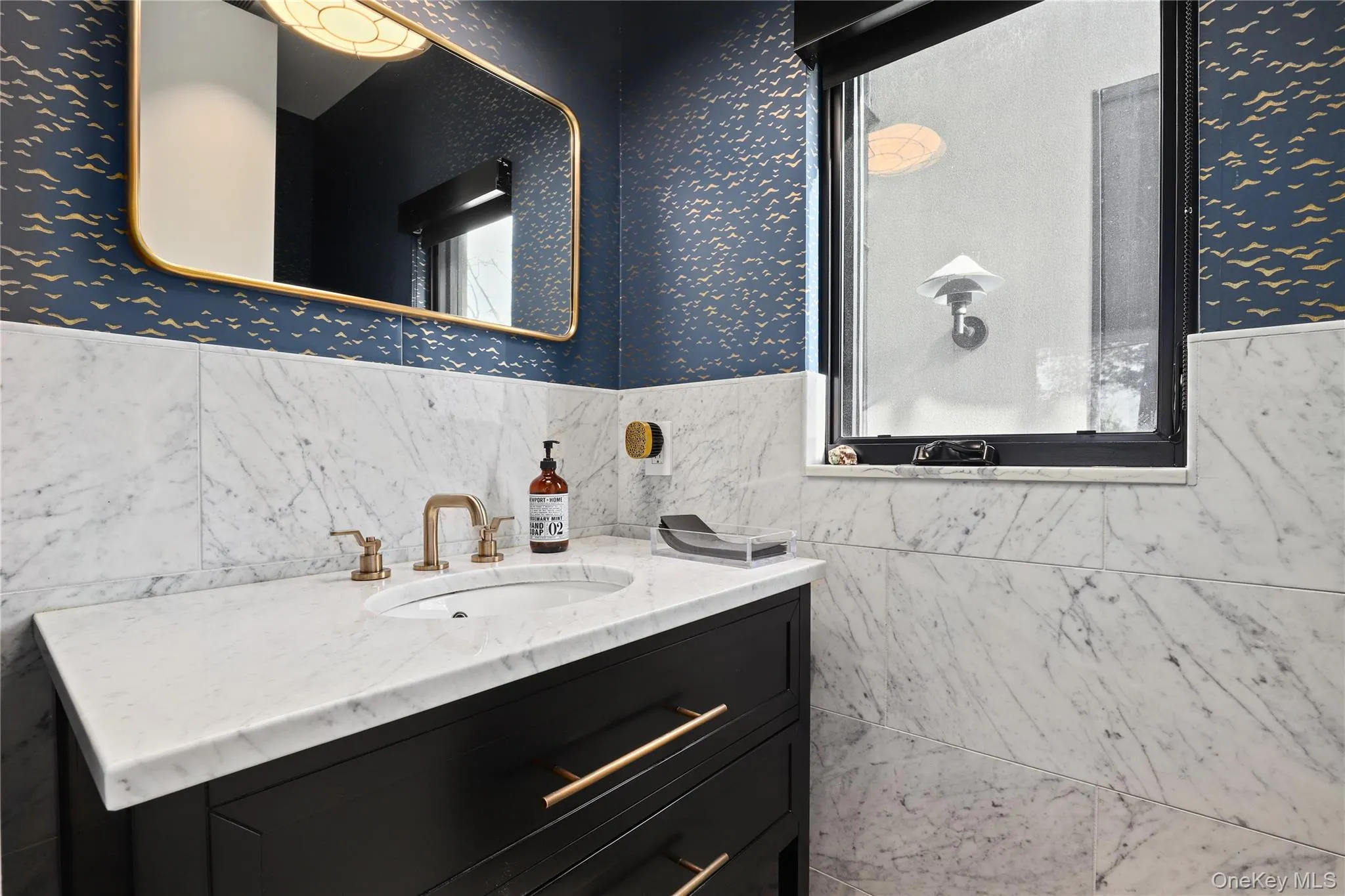 Powder Room – Statement finishes with wall-hung fixtures and custom stone sink. Powder Room – Statement finishes with wall-hung fixtures and custom stone sink.