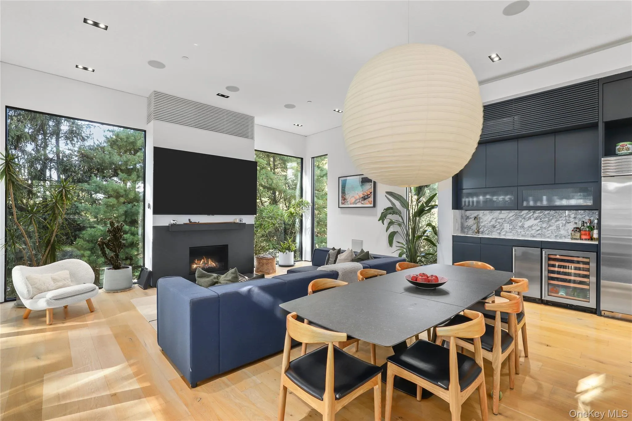 Dining Area – Designer dining space with iconic Noguchi pendant. Dining Area – Designer dining space with iconic Noguchi pendant.