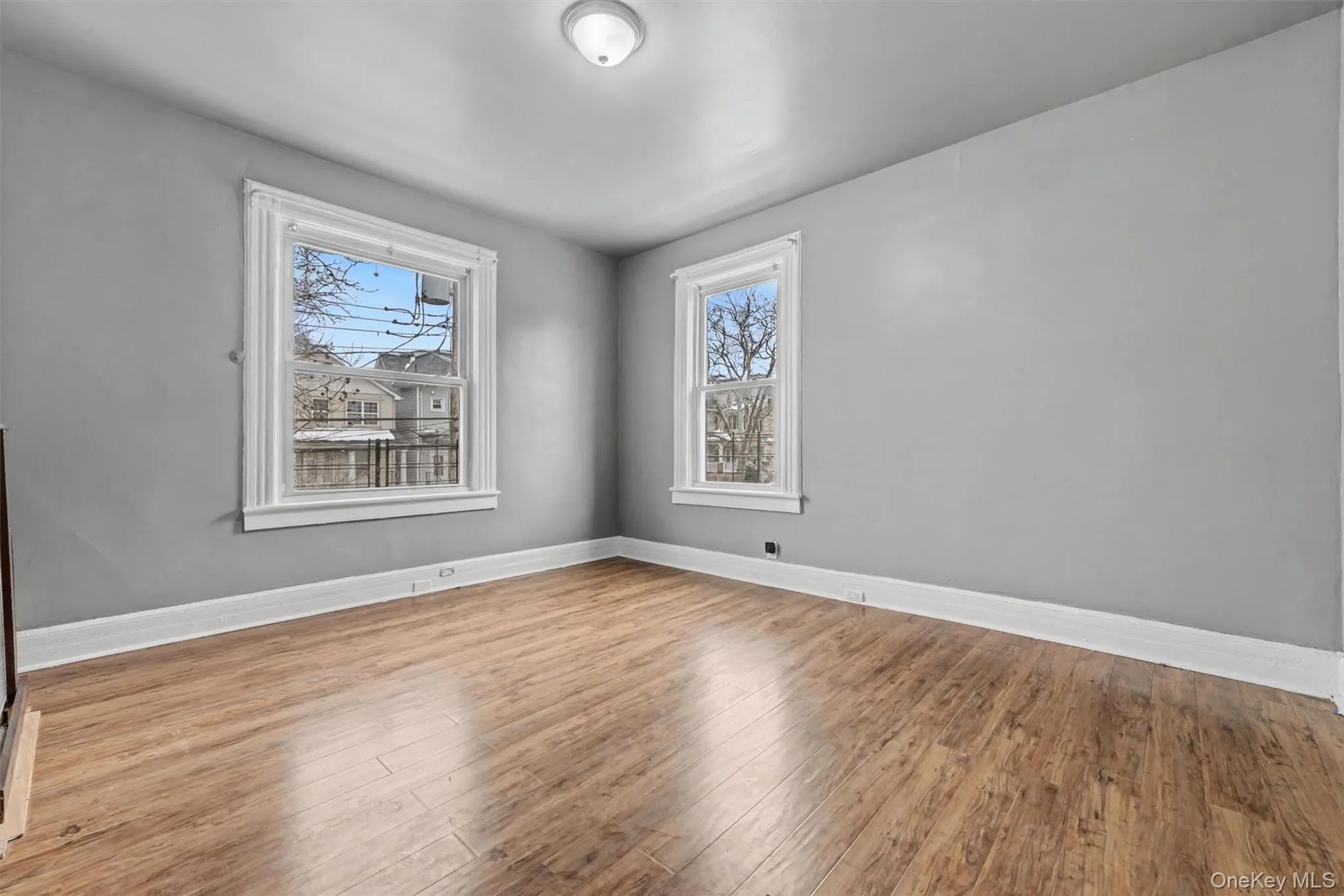Living Room Features corner window for nice breeze Living Room Features corner window for nice breeze