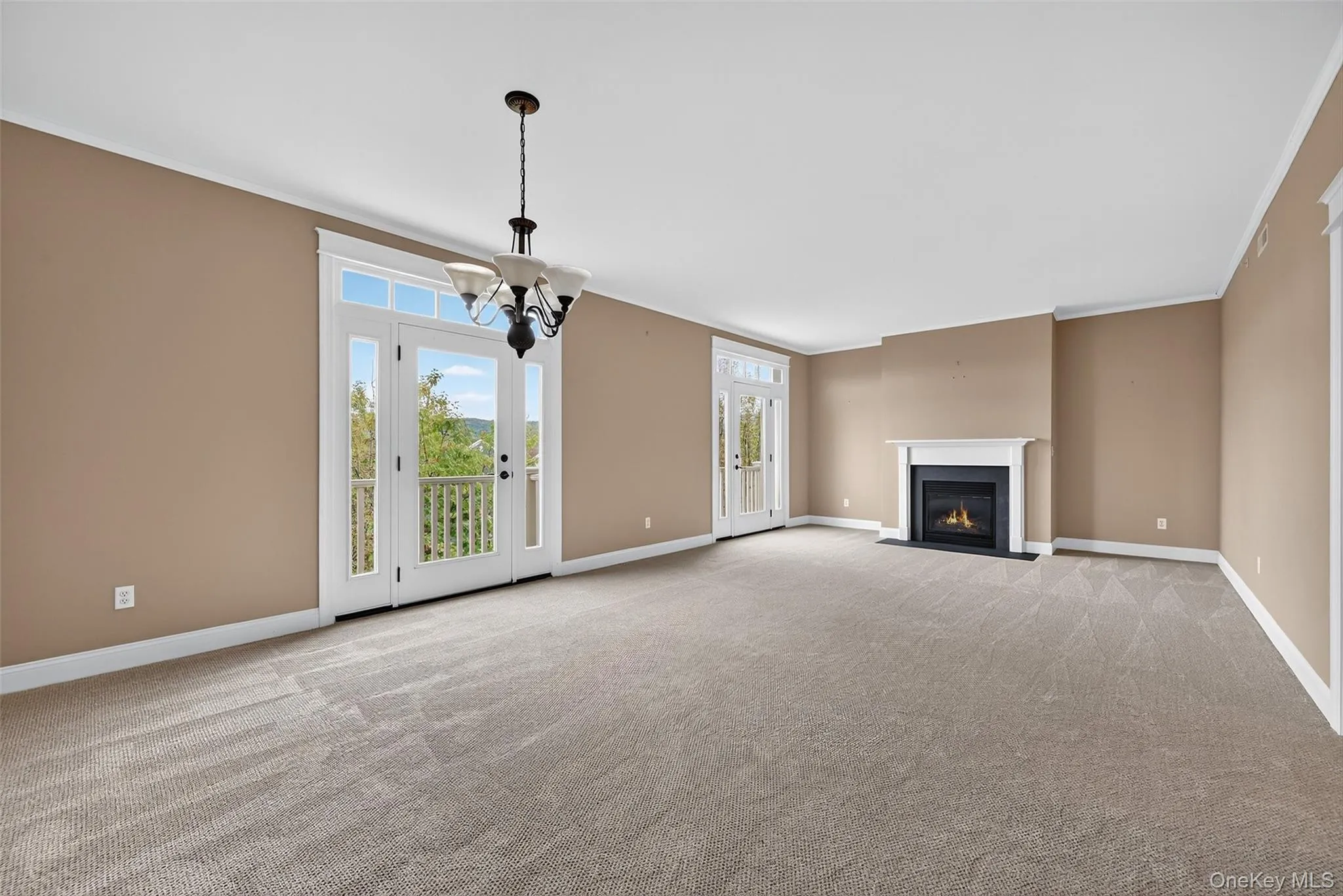 Large living room with gas fireplace. Large living room with gas fireplace.