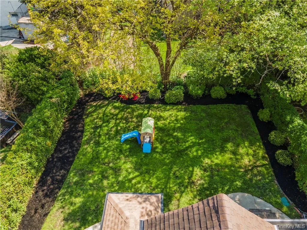 Professionally landscaped flat back yard. Professionally landscaped flat back yard.