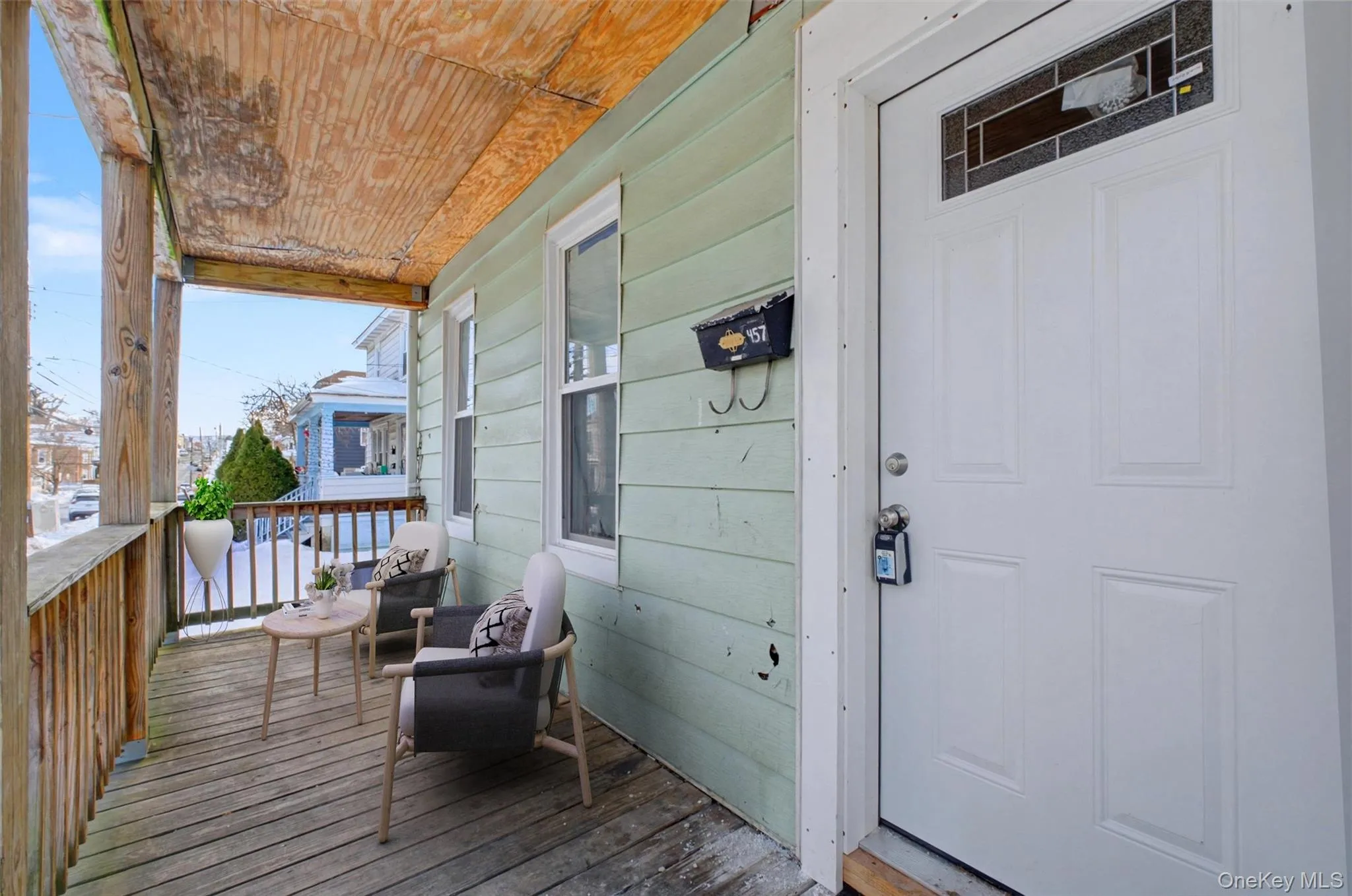 Virtually Staged Classic front porch with seating area. Virtually Staged Classic front porch with seating area.