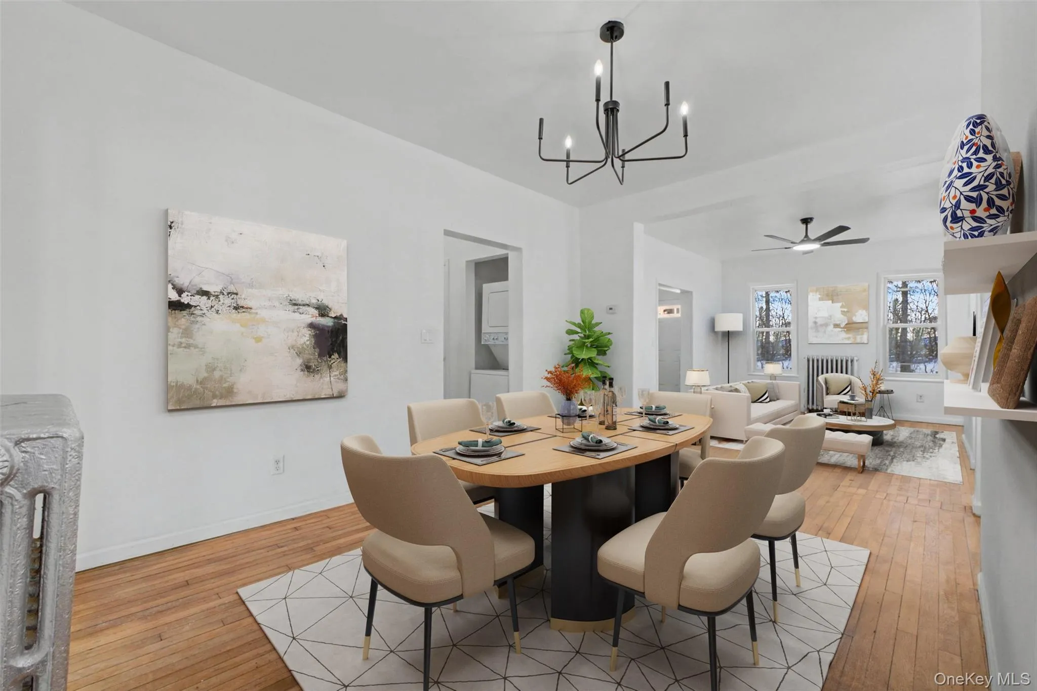 Virtually Staged Generously sized dining space seamlessly connecting to the living room, ideal for entertaining and everyday Virtually Staged Generously sized dining space seamlessly connecting to the living room, ideal for entertaining and everyday