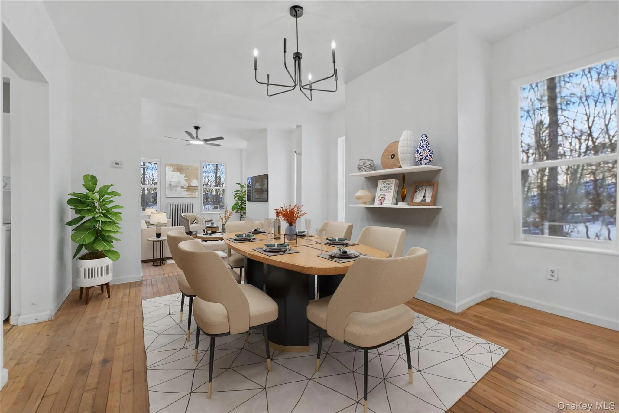 Virtually Staged Expansive dining area flowing into the adjacent living space, creating an open and airy atmosphere. Virtually Staged Expansive dining area flowing into the adjacent living space, creating an open and airy atmosphere.