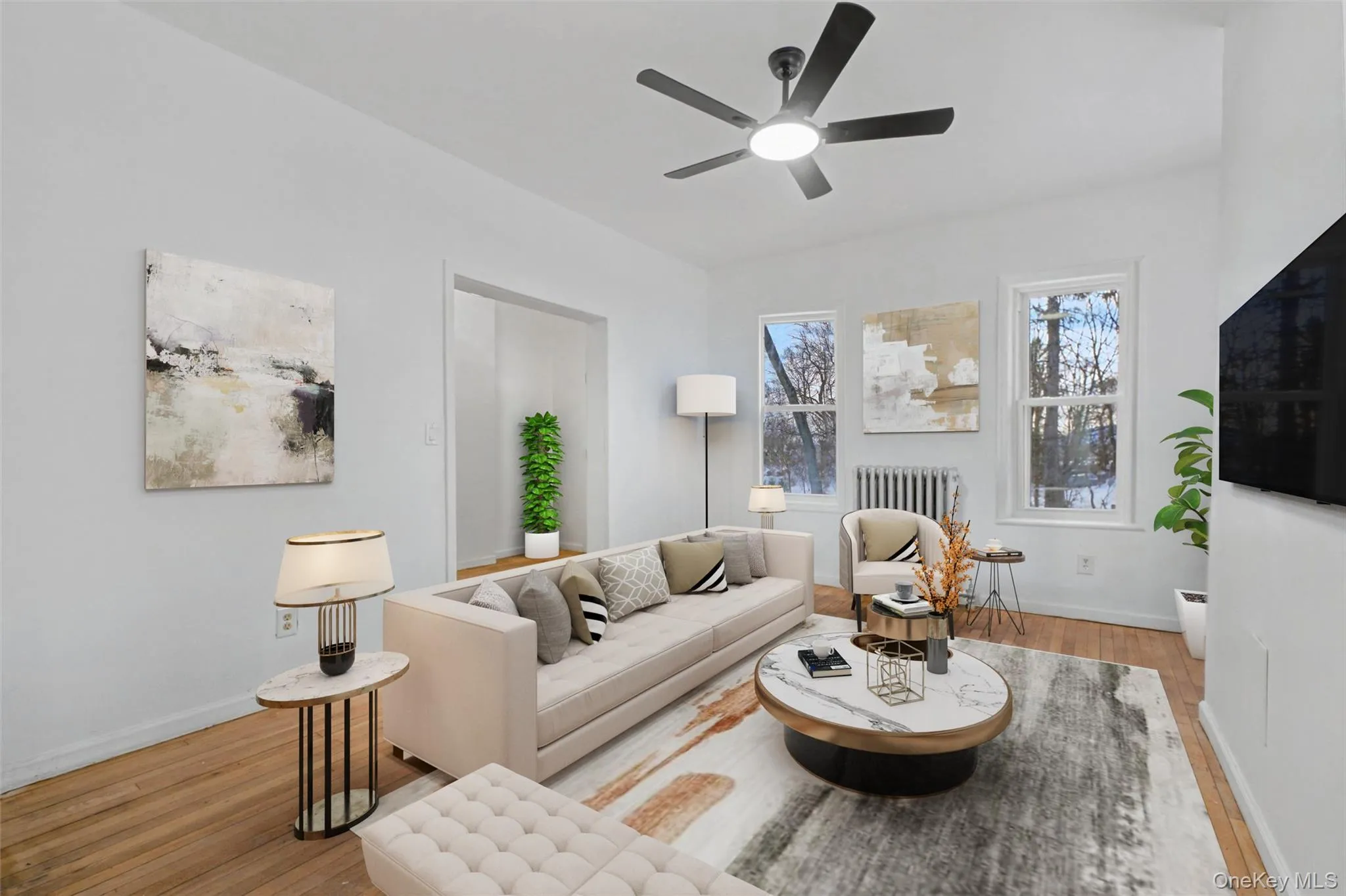 Virtually Staged Bright and spacious living room featuring hardwood floors, oversized windows, and abundant natural light. Virtually Staged Bright and spacious living room featuring hardwood floors, oversized windows, and abundant natural light.
