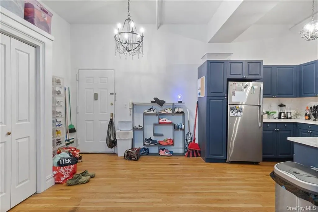 Entryway and kitchen Entryway and kitchen