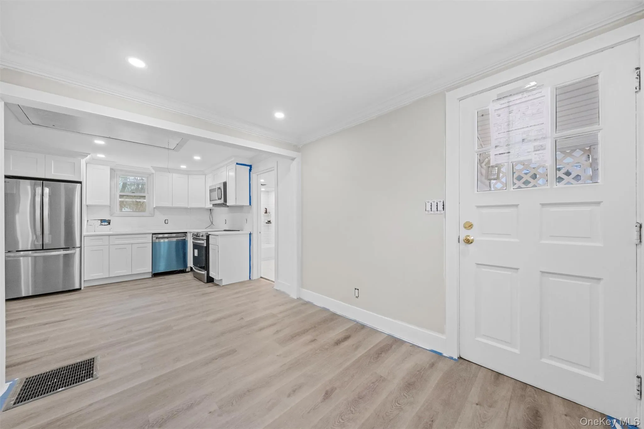 Entry into Living Room and Kitchen Entry into Living Room and Kitchen