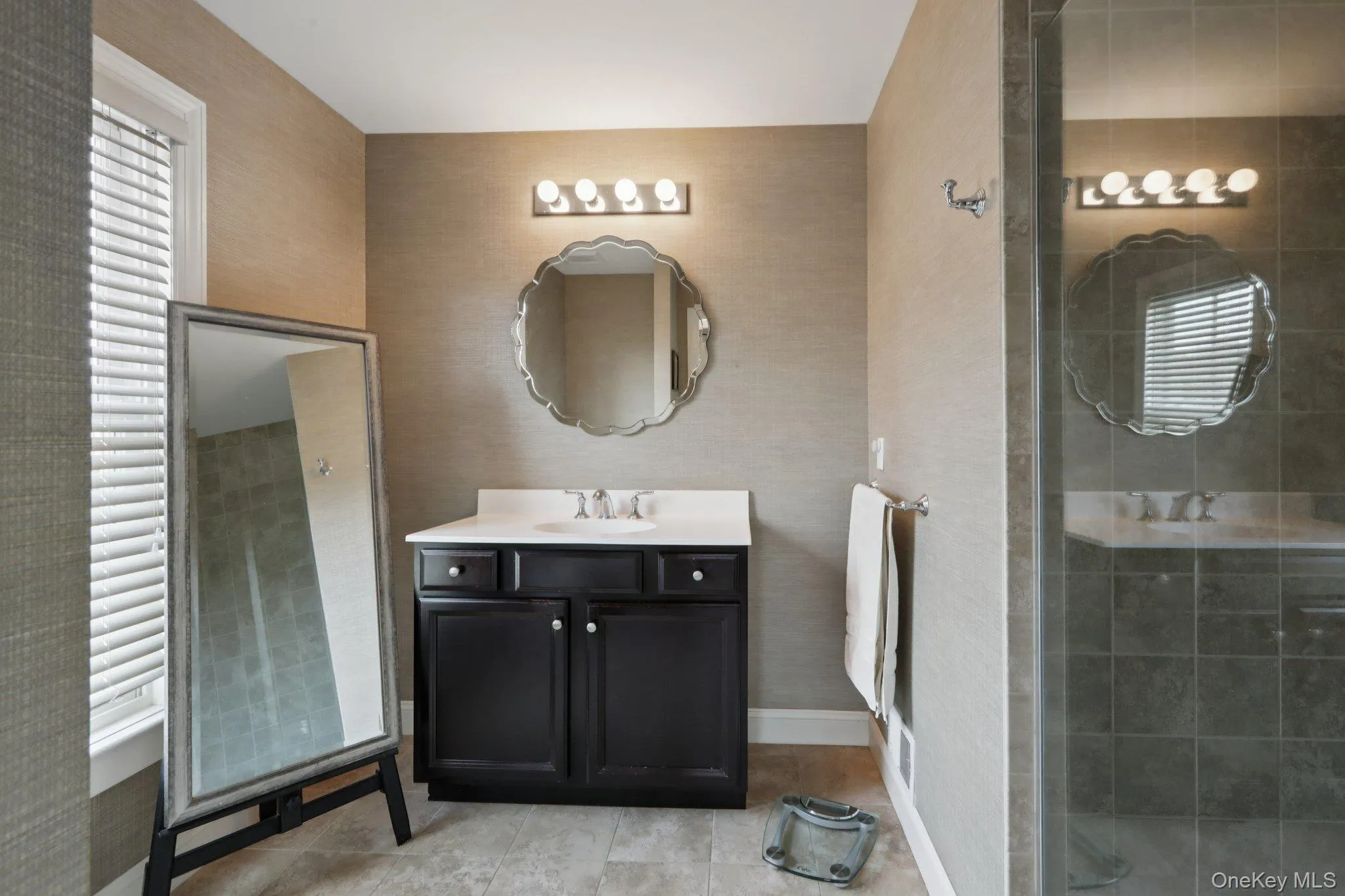 This bathroom creates a fresh and sophisticated space This bathroom creates a fresh and sophisticated space