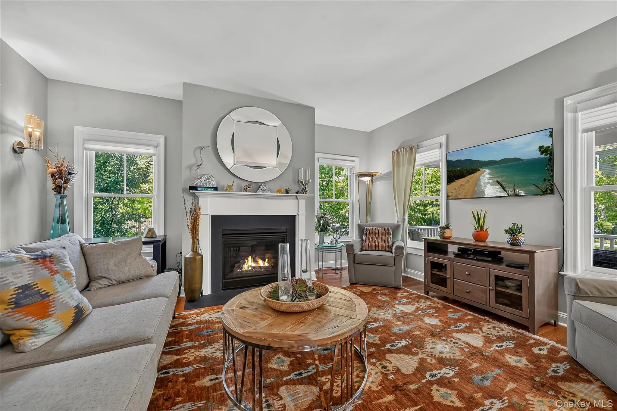 The natural gas fireplace adds warmth to the room. The natural gas fireplace adds warmth to the room.