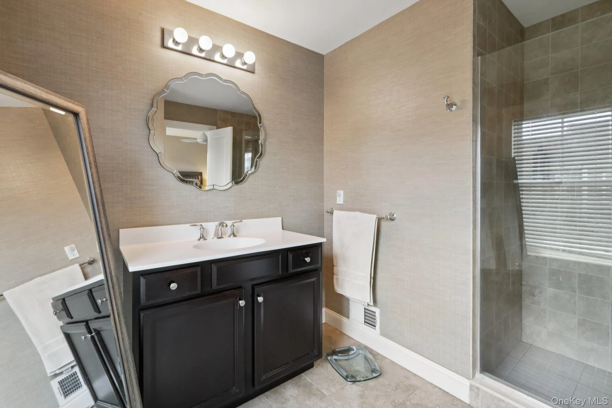 Primary bath with thoughtful design and natural lighty Primary bath with thoughtful design and natural lighty