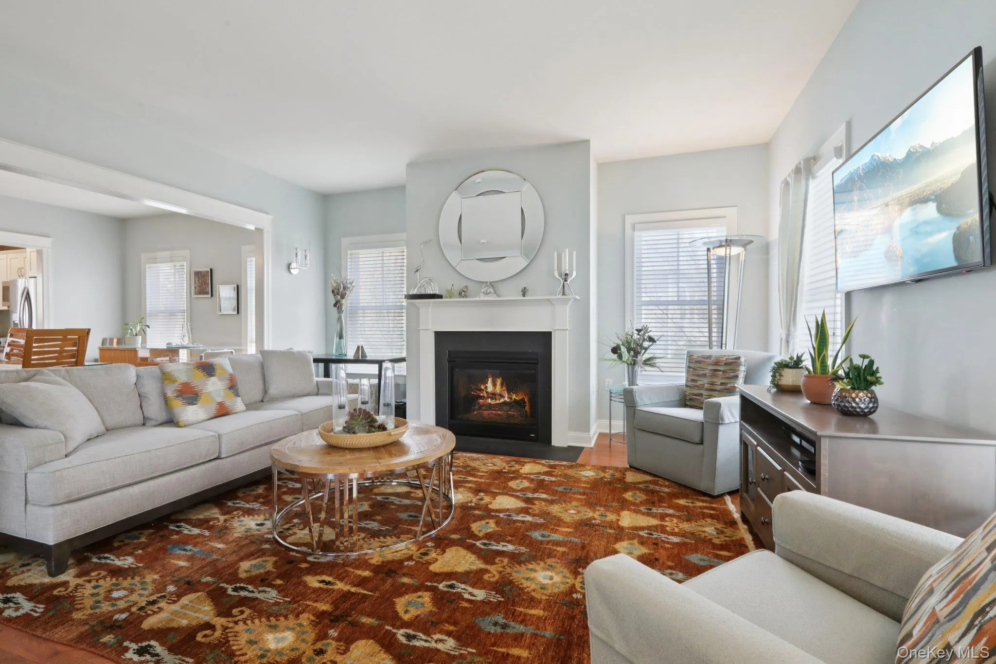 The gas fireplace is the focus as you enter the living room The gas fireplace is the focus as you enter the living room