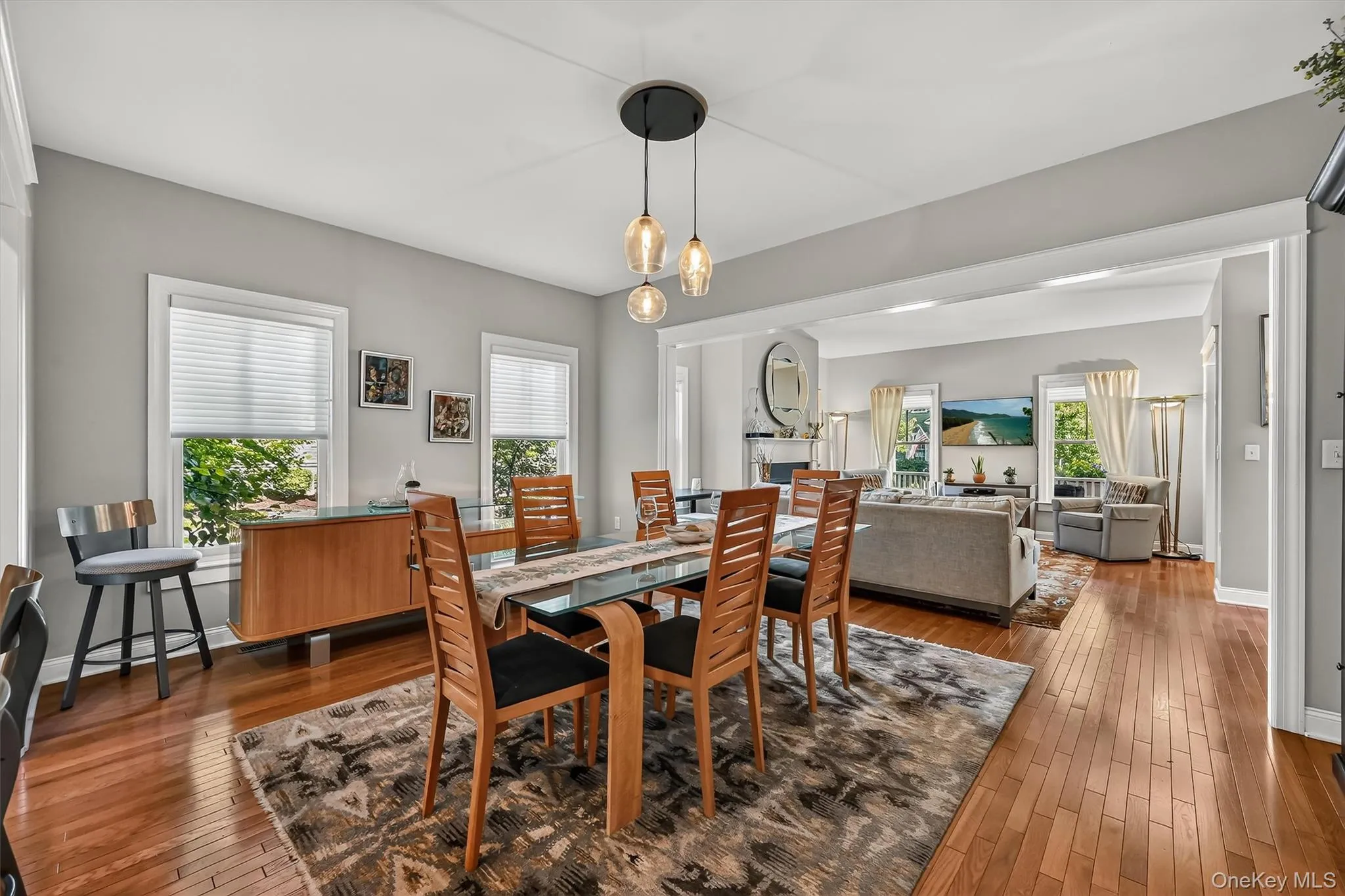 Oversized windows and extended ceilings invites the abundant natural daylight to frame the space. Oversized windows and extended ceilings invites the abundant natural daylight to frame the space.