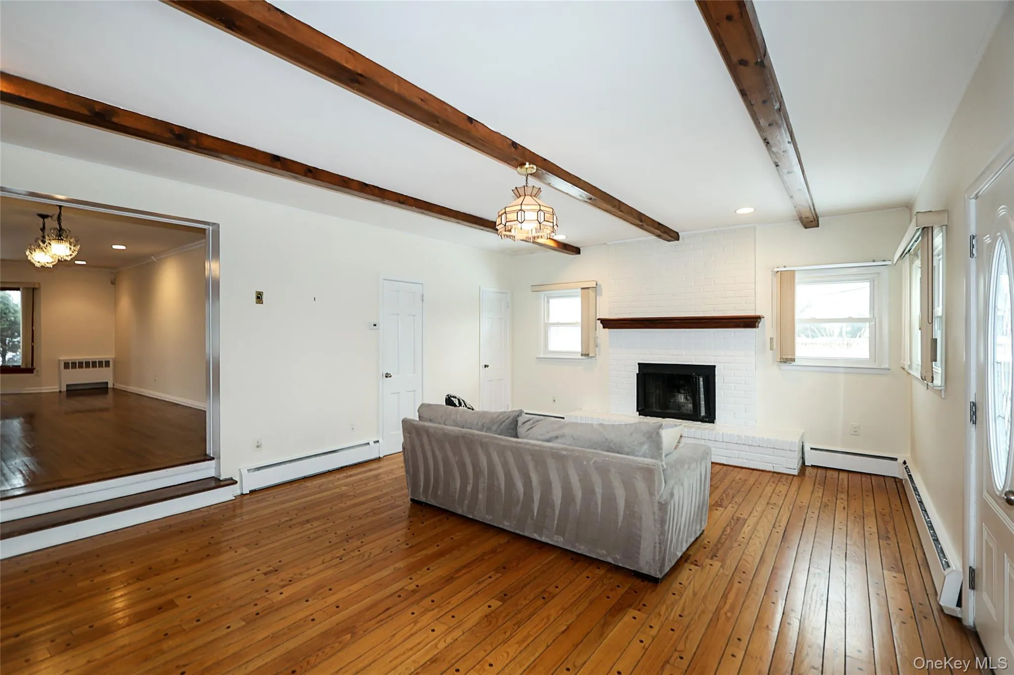 Den with wood burning fireplace Den with wood burning fireplace