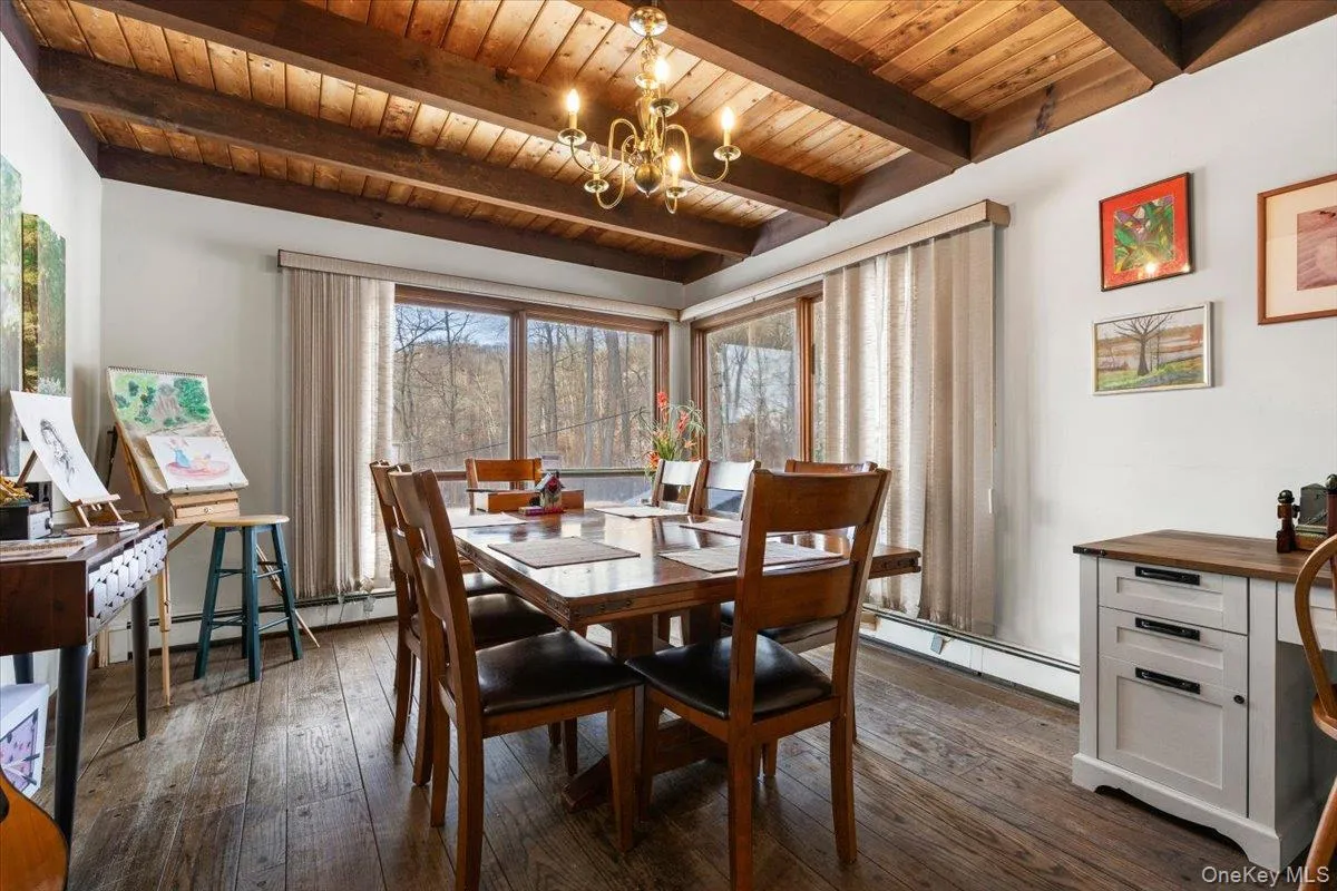 Dining Room Alternate View – Ideal for entertaining with warm wood ceilings. Dining Room Alternate View – Ideal for entertaining with warm wood ceilings.