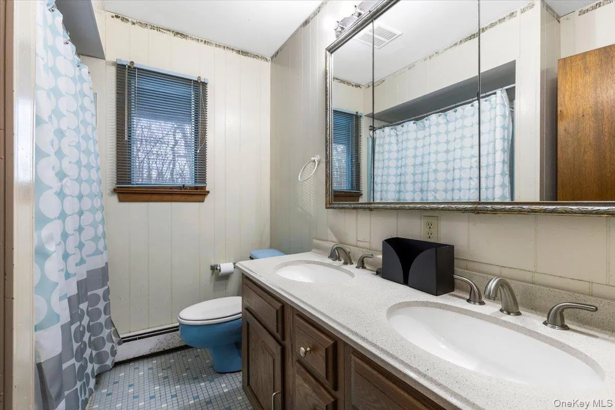 Full Bathroom – Double vanity bath with natural light. Full Bathroom – Double vanity bath with natural light.