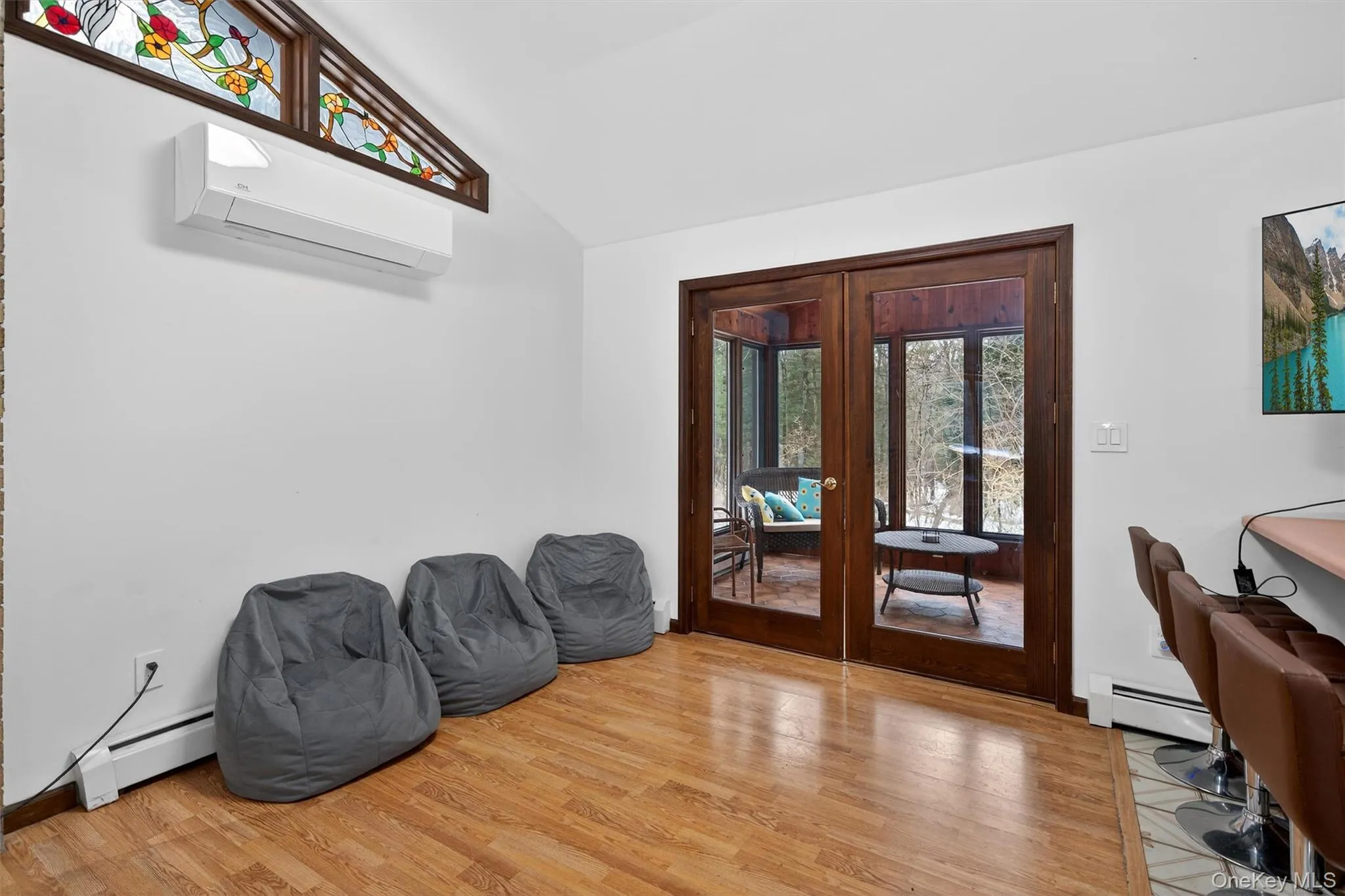 Open area with wood floors, large windows for lots of natural light. Open area with wood floors, large windows for lots of natural light.