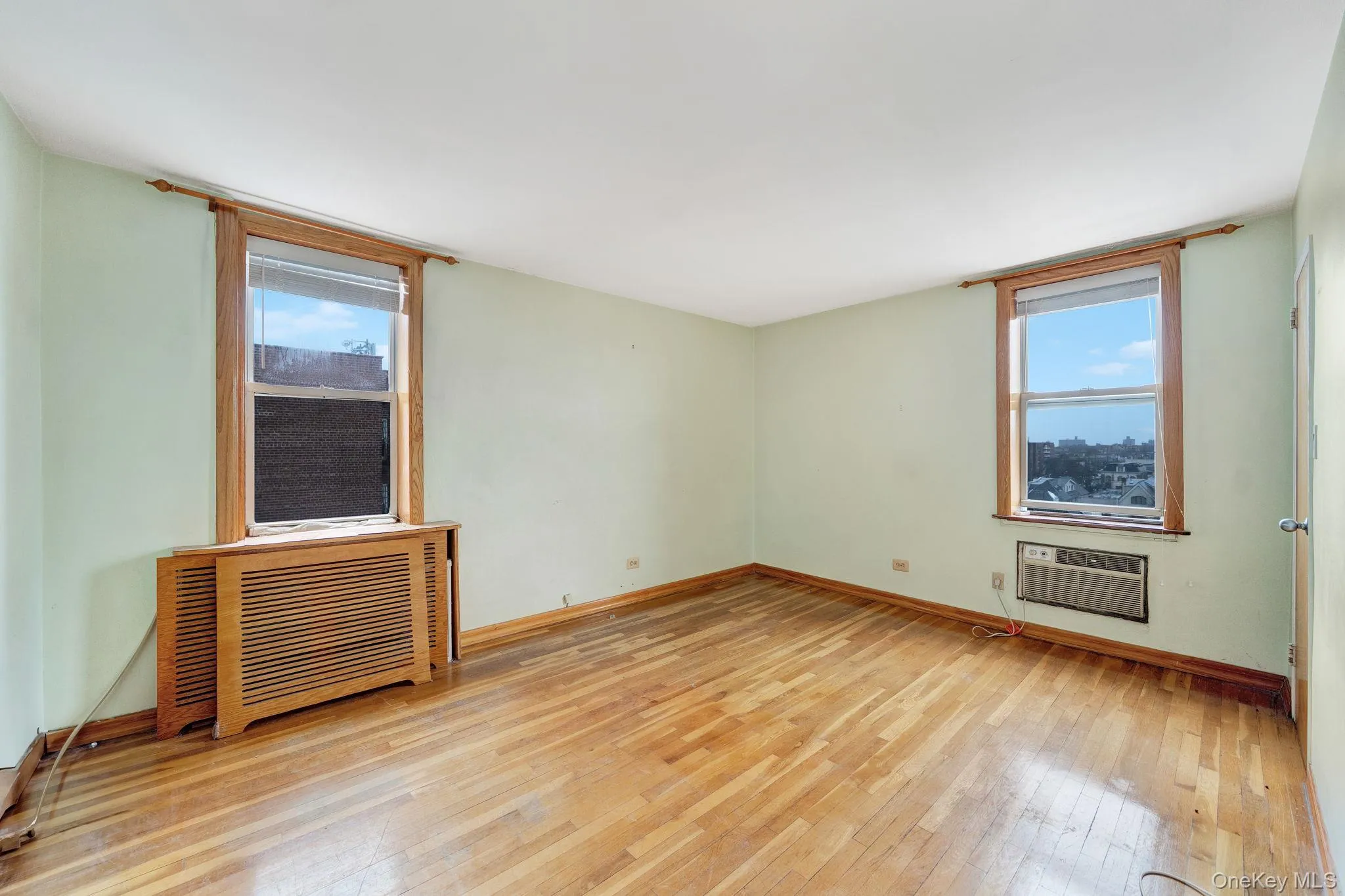 light wood finished floors and radiator heating unit light wood finished floors and radiator heating unit