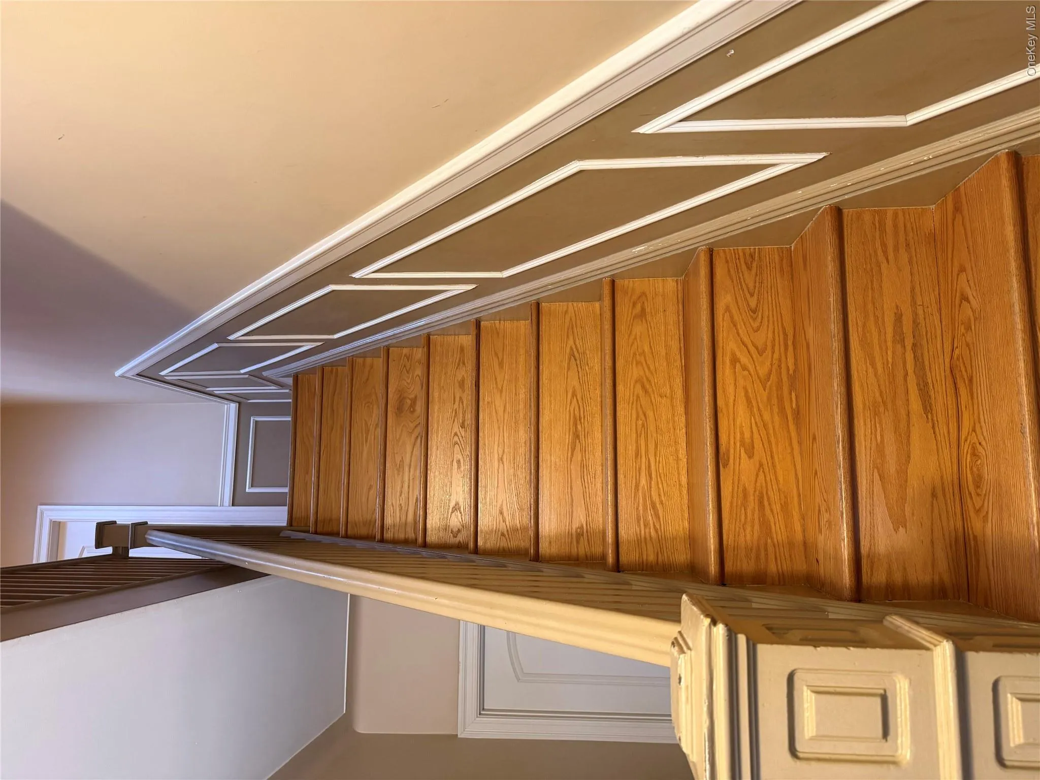 Stairway with a decorative wall and wainscoting Stairway with a decorative wall and wainscoting