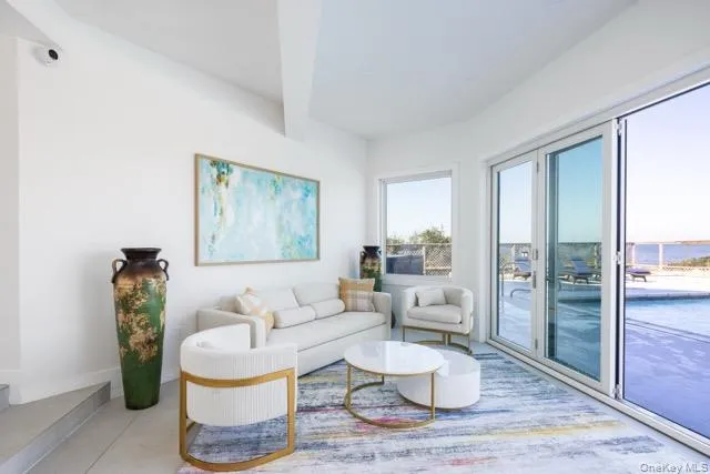 Seating area that leads to pool. Seating area that leads to pool.