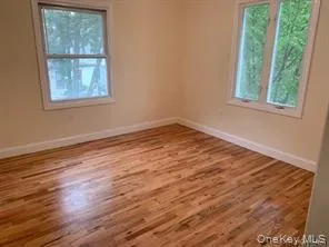 Spare Room With Light Hardwood Flooring Spare Room With Light Hardwood Flooring