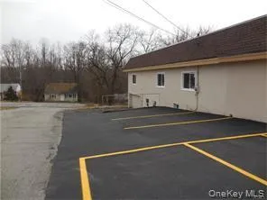 View of uncovered parking lot View of uncovered parking lot