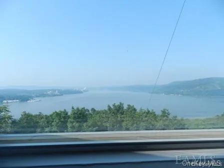 Property view of water with a mountain view Property view of water with a mountain view