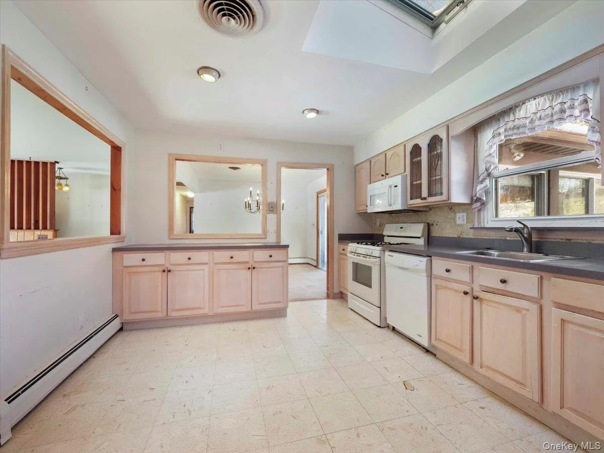 Eat in Kitchen looking into Dining Room and Living Room Eat in Kitchen looking into Dining Room and Living Room