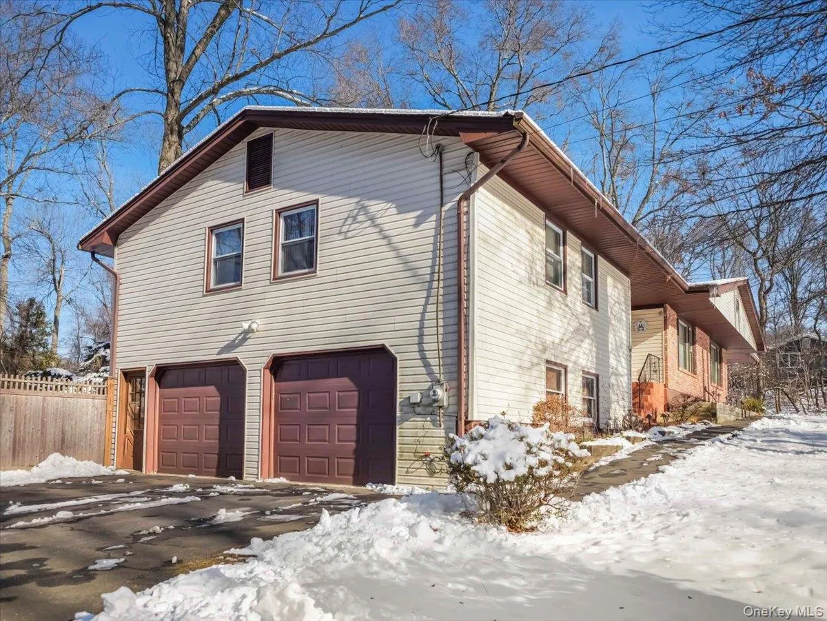 Oversized 2 car garage with separate storage room Oversized 2 car garage with separate storage room