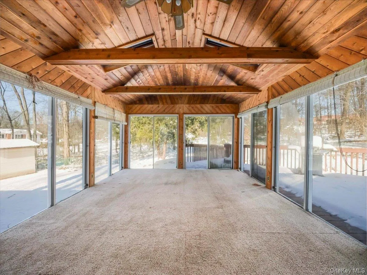 3 Season Room with access to yard and deck 3 Season Room with access to yard and deck