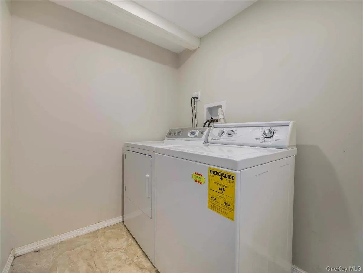 Separate Laundry Room in Basement Separate Laundry Room in Basement