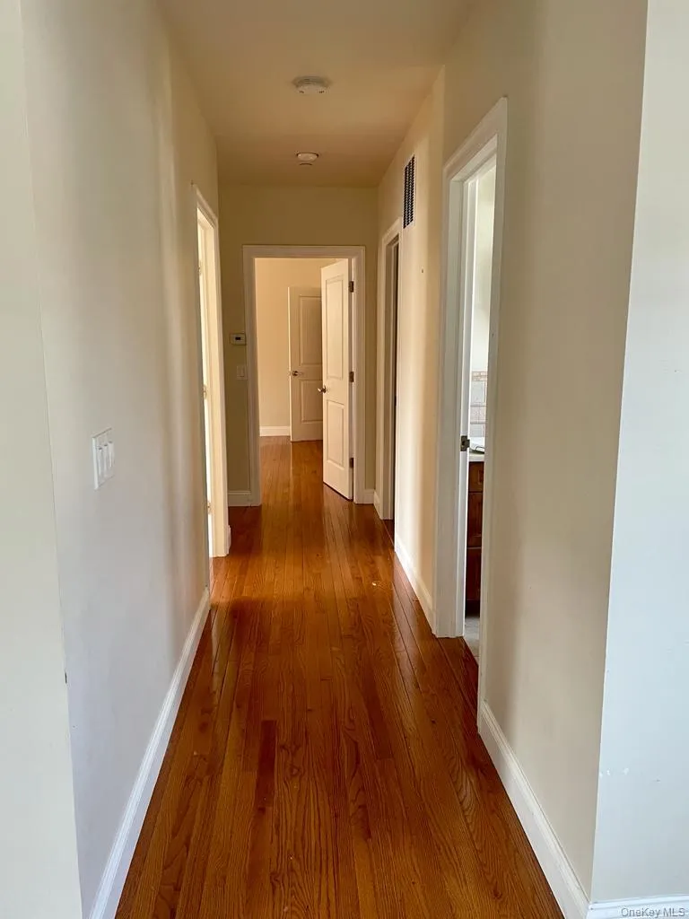 Spacious and gracious hallways with real wood floors Spacious and gracious hallways with real wood floors