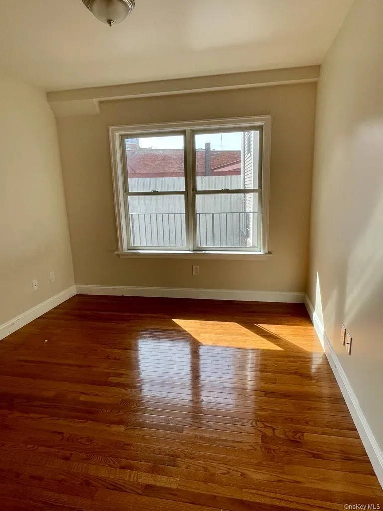 Bright bedroom with wood floors Bright bedroom with wood floors